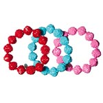 Carved-rose bracelets (red, sky and raspberry), Tarina Tarantino.