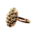 Ring of 22kt-gold plate with peridots, Pade by Pade Vavra.