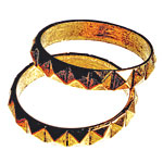 Metal bangles, Stacey Lapidus.