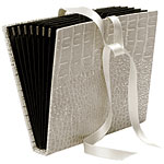 6" x 5" embossed-leather portfolio, Heinz Puetz.