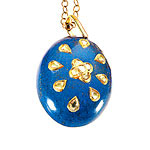 Sodalite cabochon pendant necklace with diamonds set in 22kt gold, Emily and Ashley.
