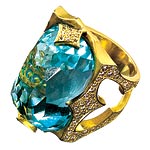 18kt-yellow-gold ring with blue topaz and diamonds, 