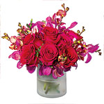 Flirtation bouquet of roses, orchids, and freesia, Preston Bailey for 1800 Flowers.com.