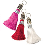 Silk-tassel key chains in pink, red or white with silver rings, Roberta Freymann.
