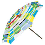 Umbrella in Tidal Stripe Sunbrella fabric with ash-wood-and-brass pole, Anthropologie.