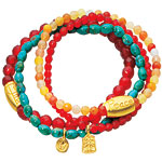 Bracelets of carnelian and turquoise with vermeil charms, Satya.