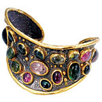 Sterling silver cuff with 24kt-gold and gemstones, Sevan Bicakci.