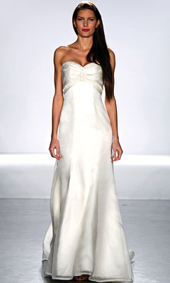 Strapless gown with ruffled sweetheart neckline by Melissa Sweet.