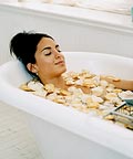 woman relaxing in tub