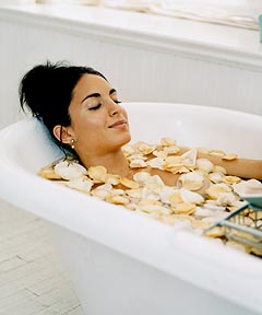 woman relaxing in tub