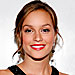 Leighton Messter with shiny red lips.