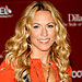 Sheryl Crow with Lustrous Curls.