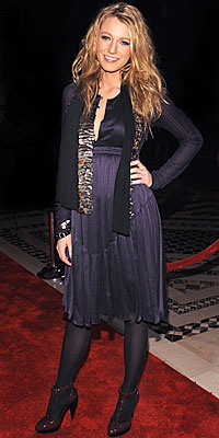 Blake Lively in Burberry and a scarf that looks like Russell Brand's