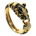 Bangle of gold plate and enamel with Swarovski crystals, Lily Posh.