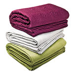 Flower-stitched polyester satin quilt in purple, white and green, DKNY.