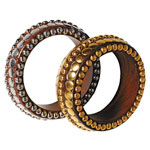 Metal and wood bracelets, Amrita Singh.