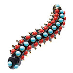 Pin of faux turquoise and coral cabochons, Kenneth Jay Lane.