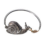 14kt-white-gold snail bracelet with diamonds and 14kt-gold leaf, Katherine Azarmi-Rose.