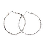 Sterling silver Delight hoop earrings, Ashley Morgan.