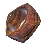 Wide bangles, Pono by Joan Goodman.