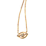 18kt gold and diamonds charm, Suzanne Felsen.