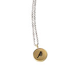 Sterling silver and 10kt gold charm, Me & Ro.