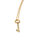 18kt gold and ruby charm, Roberto Coin.
