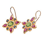 Star-shaped earrings of 24kt gold with semiprecious stones, Nava Zahavi.