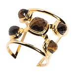 Gold-plated cuff with tiger's eyes, Kara Ross.