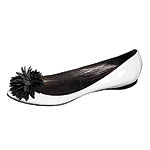 Patent leather flats with pompon detail, Sigerson Morrison.