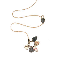Steel and gold necklace with multiple charms, Philip Crangi.