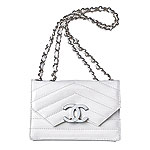Patent leather bag with calf-skin-and-metal straps, Chanel.