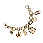Gold -tone chain link bracelet with charms and crystals, DKNY.