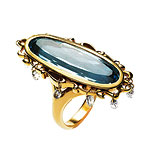 Topaz ring in 18kt gold surrounded with diamonds, 