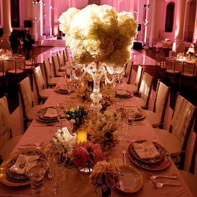 Floral centerpieces small and tall decorated the tables where the newlyweds'