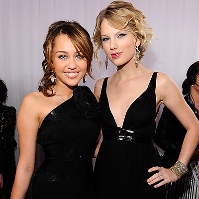 taylor swift 2009 grammy. Miley Cyrus and Taylor Swift, grammy awards. Kevin Mazur/WireImage