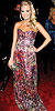 Carrie Underwood in Naeem Khan and Rene Caovilla, carrying Mary Norton Carrie Underwood in Naeem Khan and Rene Caovilla, carrying Mary Norton