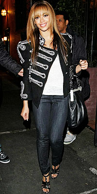 Beyonce in Balmain and Anlo carrying Vera Wang