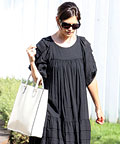 Katie Holmes wearing Valextra