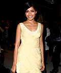 Freida Pinto wearing Burberry