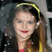Suri Cruise Wears Red Lipstick