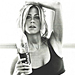 Aniston Shows Her Perfect Abs in New Ad