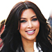 Kim Kardashian in Christian Louboutin over-the-knee boots
