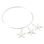 Sterling-silver bangle with starfish, A by Andrea Barna.