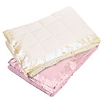 Satin-trim down blankets in buttercream and pale pink, L.L. Bean.
