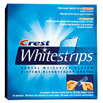Nothing can beat professional lightening, but for a less expensive alternative, dentists like Crest Whitestrips. You'll see results after two weeks., Crest.