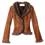 Brown leather jacket with fur trim, Valentino.