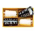 Holiday set with four signature scented candles in yellow gift box, Acqua di Parma.