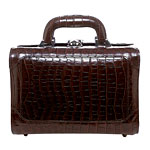 Chocolate-brown faux-crocodile cosmetics case with two removable satin-lined trays, Bobbi Brown.