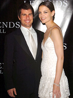 {Katie Holmes} {} and {Tom Cruise} {}